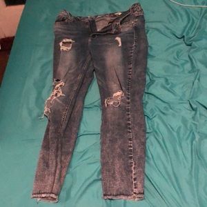 distressed and ripped jeans. brand “seven7”